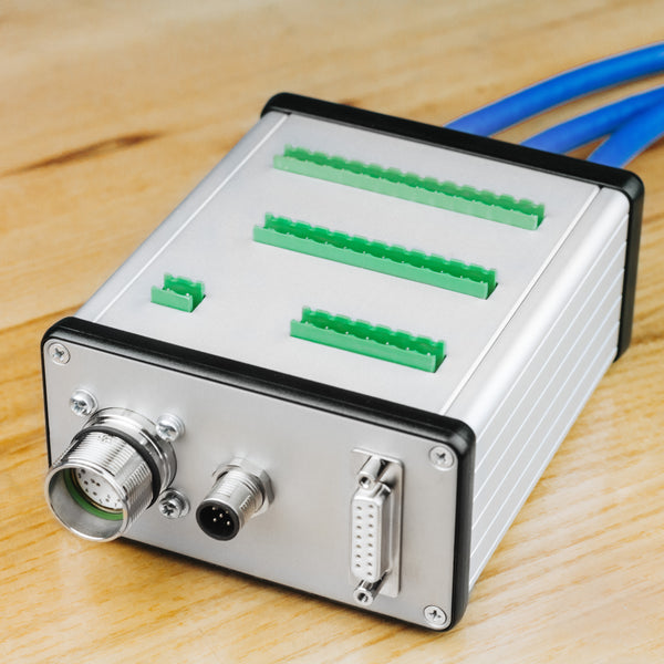 CableMATE Feedback Cable Adapter Front View on Workbench with Wood Countertop