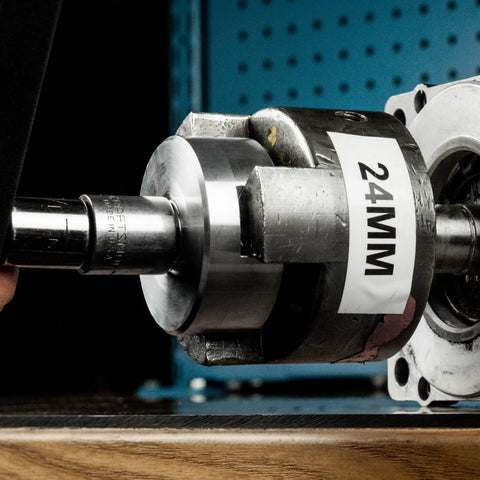Tech using brake torque hub, torque wrench, and coupler to measure brake torque